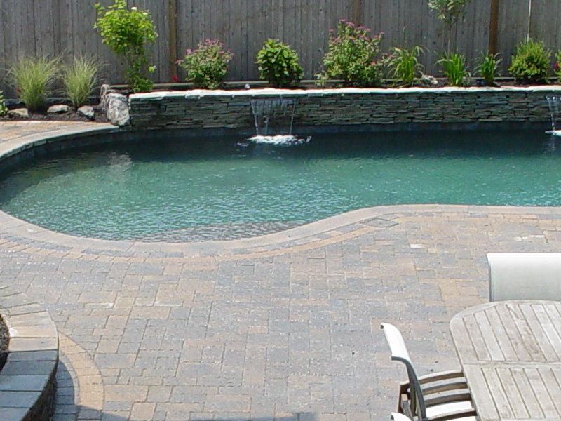 stacked stone sheer descent pool water feature